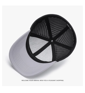 Detailed top view showing breathable perforated mesh lining and grey visor of the baseball cap