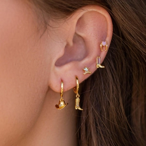 Golden Western cowboy earring set featuring sheriff star, boots, and horseshoe designs