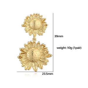 Detailed view of gold sunflower drop earrings showing exact size measurements and weight