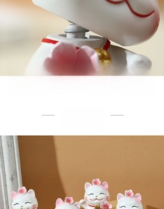 Detail view of the built-in spring for the lucky cat bobblehead resin figurine