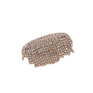 Barrette élégante en métal doré avec strass scintillants et franges de pompons brillants