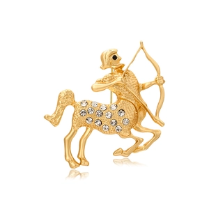 Vintage gold Sagittarius brooch with sparkling crystals and bow and arrow design