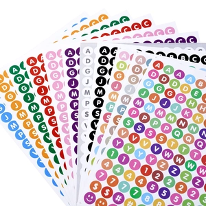 Macro detail of colorful 0.5-inch round letter stickers for DIY cards and scrapbooks