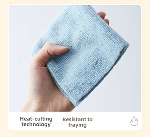 Detail view of microfiber cleaning cloth showing thermal cut edges and lint-free durability
