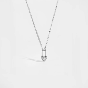 Detailed close-up of S925 sterling silver heart lock necklace with a sparkling diamond inlay