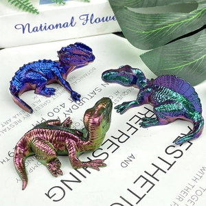 Three 3D resin dinosaur figurines with iridescent metallic finish on a lifestyle background