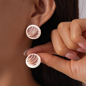 Retro geometric round stud earrings with white and reddish-brown striped enamel pattern