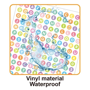 Waterproof vinyl letter stickers with water droplets showing durable material