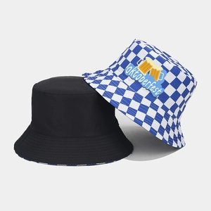 Blue and white plaid Oktoberfest bucket hat with beer graphic and black reversible sun hat
