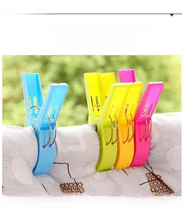 Detail of 4-pack large windproof plastic clothes pegs for blankets and heavy laundry