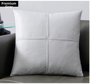 Detail of premium gray technical fabric pillow with modern cross-stitch decorative seams