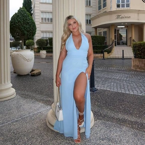 Sexy light blue halter neck maxi dress with deep V-neck and high slit for summer fashion