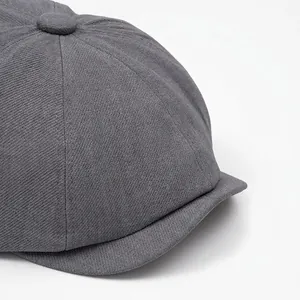Classic dark grey octagonal newsboy hat with a wide brim in a solid color cotton blend