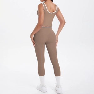 Detailed back view of mocha yoga set with white trim and cross-waist leggings
