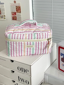 Striped quilted large cosmetic bag with handle and colorful patterns for travel storage