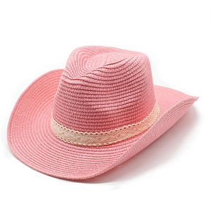 Detailed view of pink straw cowboy hat with off-white lace band on white background