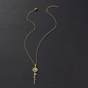 Detail of custom gold stainless steel rose necklace with Sophia name pendant and chain
