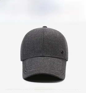 Front view of dark grey winter baseball cap featuring thick wool fabric and metal logo