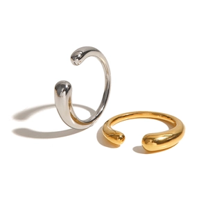 Minimalist oval open rings in gold and silver finish with smooth metallic texture