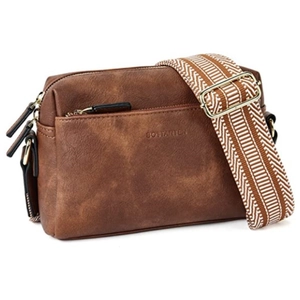 Detail view of brown leather crossbody bag with striped strap and gold metal hardware