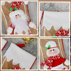 Christmas stocking set with Santa and Mrs. Claus plush dolls in red and white knit material