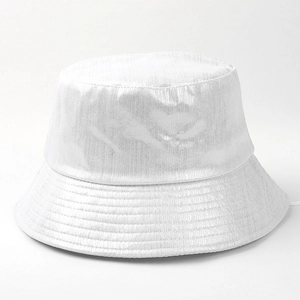 Detailed view of white bucket hat with metallic coating and reinforced stitched brim