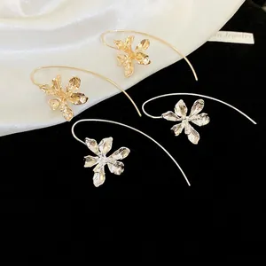 Elegant French iris flower drop earrings in gold and silver finish with crystal petals