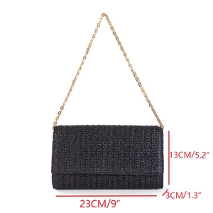 Detail showing dimensions of black woven clutch bag with a golden chain strap