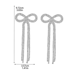 Silver bow tassel earrings with shiny rhinestones, dimensions 9.72cm by 3.57cm