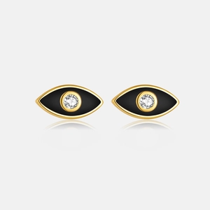 Macro shot of S925 silver evil eye stud earrings with gold plating and black enamel inlay