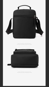 Detail view of black nylon messenger bag featuring rear zipper pocket and reinforced bottom
