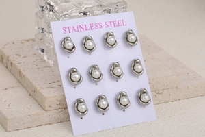 Detailed set of twelve stainless steel pearl stud earrings in a pea pod design style