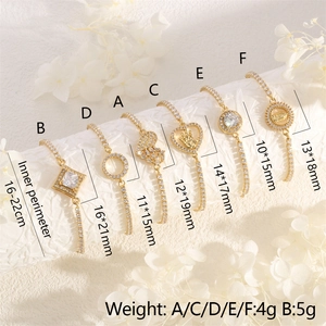 Detail of six adjustable 18K gold plated copper bracelets with sparkling zircon charms