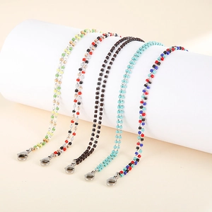 Bohemian colorful seed bead bracelets with stainless steel clasps on white stands