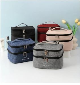 Macro shot of double-layered travel toiletry bags in five colors with metal zippers