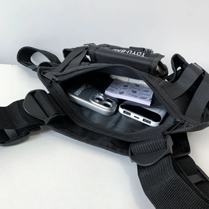 Tactical black vest bag with adjustable nylon straps and spacious interior storage