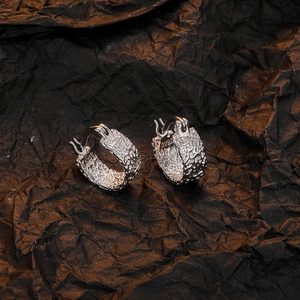 Lava texture C-shaped hoop earrings in 925 sterling silver with a rustic metal finish