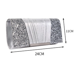 Detail view of silver evening clutch bag with glitter texture and 24cm size marking