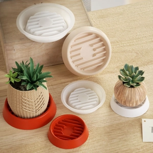 Close-up of round striped silicone mold tray in various colors for DIY resin and home decor