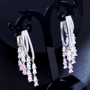 Detailed macro view of S925 silver layered tassels with pink zircon water drop stones