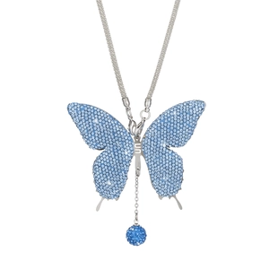 Close-up of sparkling blue rhinestone butterfly pendant with matching crystal ball