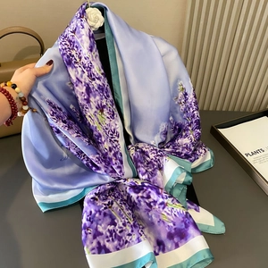 Lavender print silk scarf in light purple and blue with elegant floral patterns