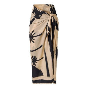Beige beach sarong with black palm tree print featuring a tie-waist wrap design