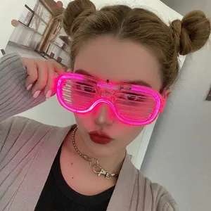 Detail of pink LED shutter glasses on model for nightclubs and music festival parties
