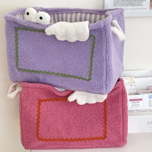 Monster plush storage baskets in purple and rose pink with cute embroidered cloud and eyes