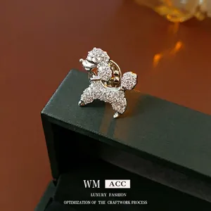 Exquisite silver poodle brooch with pavé-set zircons on a luxury jewelry box
