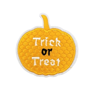 Halloween pumpkin patch with Trick or Treat embroidery and orange iron-on pumpkin texture