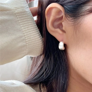Minimalist matte silver U-shaped curved stud earrings for women in brushed finish