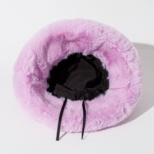 Plush light purple faux fur bucket hat with warm lining and adjustable straps for winter