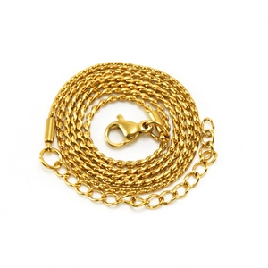 Detail of gold-plated stainless steel rope chain with secure lobster clasp and extender